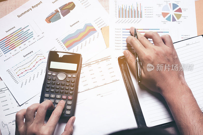 Topview finance concept, business woman doing finance with calculate。